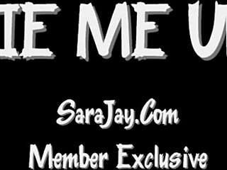 Sara Jay enjoys fun bondage with kissing.