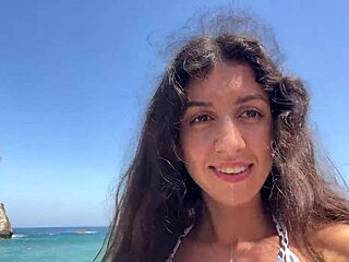 Beautiful Brunette Walks Beach with Cum on Face