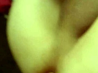 girl fucks guy's ass with strapon in intense anal session, making him moan loudly