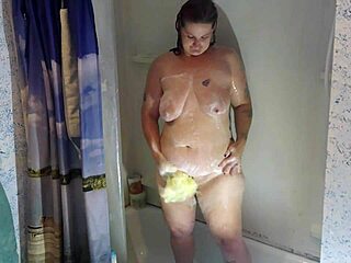 Pierced nipples milf enjoys shower time with dildo maledom play leading to squirting orgasm in bathroom