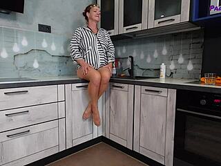 mature redhead iris teases with legs and feet in tan pantyhose display