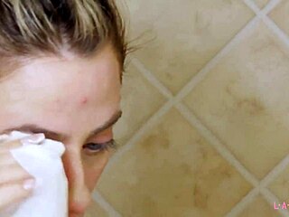 Gorgeous blonde took a relaxing shower after her photoshoot session on the sofa