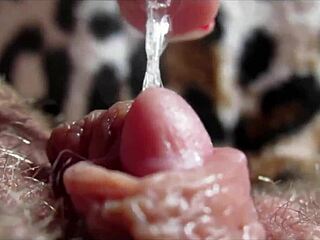 Big clit pulses in closeup as she reaches intense orgasm with wet pussy rubbing