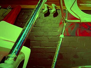 Dominatrix mistress april dominates with huge latex-clad holes, bending over for intense double fisting in wild femdom group session