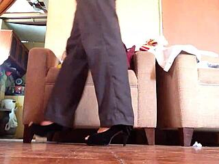 Bold shemale walking in black high heels with intense flair