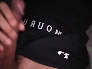 hot guy moans loudly jerking big cock in tight gym clothes on bed