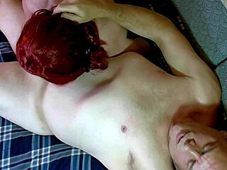 Seductive redhead in stockings and corset delivers passionate blowjob