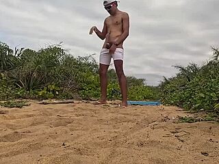 hey, check out this intense handjob and cumshot on the beach with african vibes