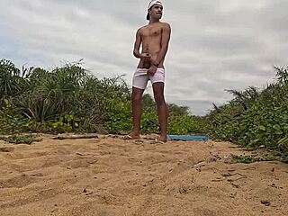 hey, check out this intense handjob and cumshot on the beach with african vibes