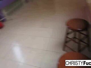 christy mack enjoys her impressive features on the kitchen counter