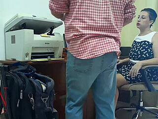 Brunette femdom boss dominates employee with intense pussy licking in office hidden cam.