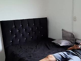 My friend finds me masturbating in the bedroom wearing a dress and panties.