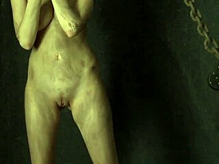 in a dirty cosplay fantasy, a cute chained woman with shaved pussy and small tits masturbated while tied up