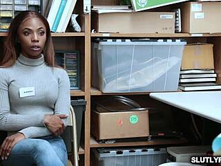 Officer interacts with ebony individual in office setting