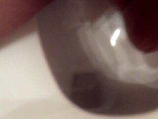 he grabs his toy and starts jerking off slowly in the quiet room