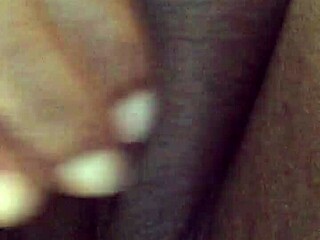 Ebony Babe Unleashes Massive Squirting Orgasm While Masturbating Hard On The Sofa