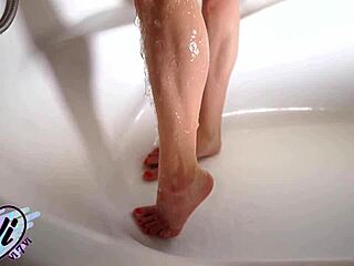 Teen masturbate pussy in the bathroom under running water