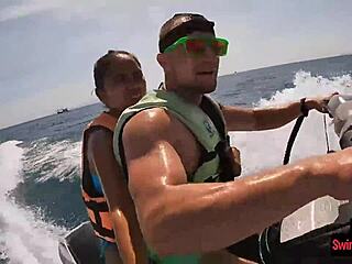 In an adventurous twist the asian girlfriend surprises with a daring public blowjob on a jetski outdoors