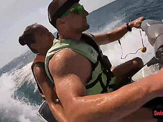 In an adventurous twist the asian girlfriend surprises with a daring public blowjob on a jetski outdoors