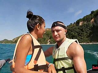 In an adventurous twist the asian girlfriend surprises with a daring public blowjob on a jetski outdoors