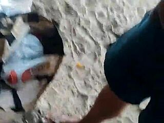 Hey, this amateur couple goes wild with public beach sex and a stranger joins for cumshot! 🌊🍆💦