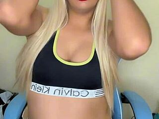 The athletic transsexual shows off her rich tits in a sporty display during the solo session
