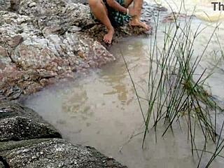 Outdoor fun by the river with a hot Indian couple in doggystyle action