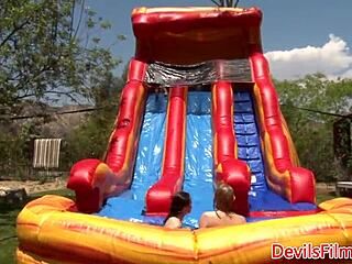 Lesbian beauties toy shaved pussies outdoors but crave intense strapon anal action instead.