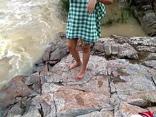 Outdoor fun by the river with a hot Indian couple in doggystyle action