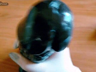 i'm jerking off this big black dildo with gloves on