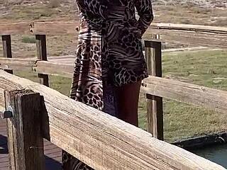 Staci dominates in leopard outfit for outdoor crossdressing fetish romp