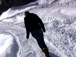 on our ski vacation i enjoy the snow with a fun striptease outdoors