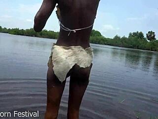 African tribe woman gets softcore pussy fucking from tourist in tropical forest stream