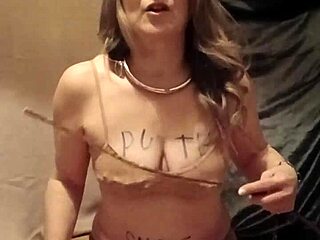 Bound housewife humiliates herself with dildo pins outdoors?