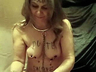 Bound housewife humiliates herself with dildo pins outdoors?