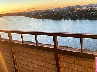 gerageyn smokes while slurping bimbo blowjob cum on public balcony