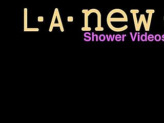 shy big-haired brunette strips for steamy shower photoshoot