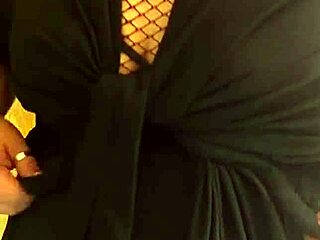 Chubby wife whore shows huge natural tits in fishnet bra