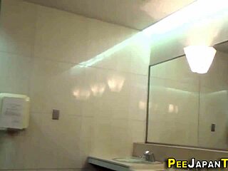 hidden cam catches asians peeing in public!