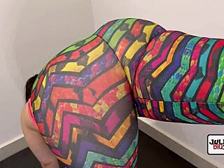 Gym student pedals bike in tight thong workout