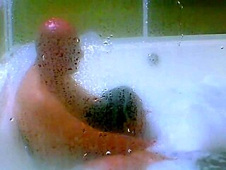 Cum blasts into jacuzzi as agarabas shakes natural tits!