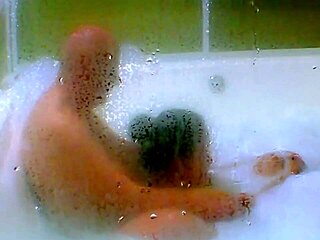 Cum blasts into jacuzzi as agarabas shakes natural tits!