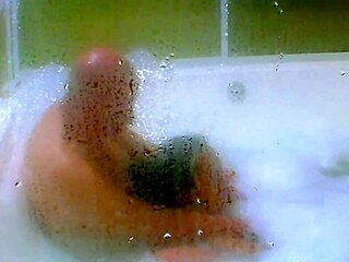 Cum blasts into jacuzzi as agarabas shakes natural tits!