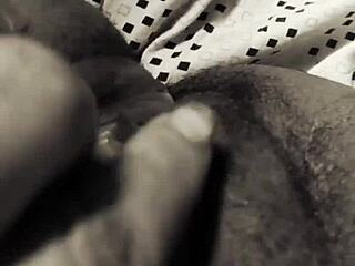 woman rubs her wet folds gently